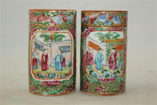 Pair of Chinese famille rose cylindrical brush pots, mid 19th century, 10.5cm., one cracked(-)